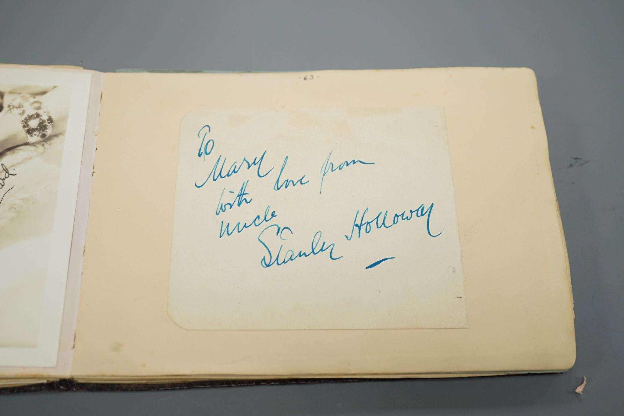 A 1930-40's autograph album including Judy Garland, Spencer Tracy, Basil Rathbone etc. and a photo album